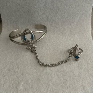 Silver tone and turquoise bracelet and attached ring